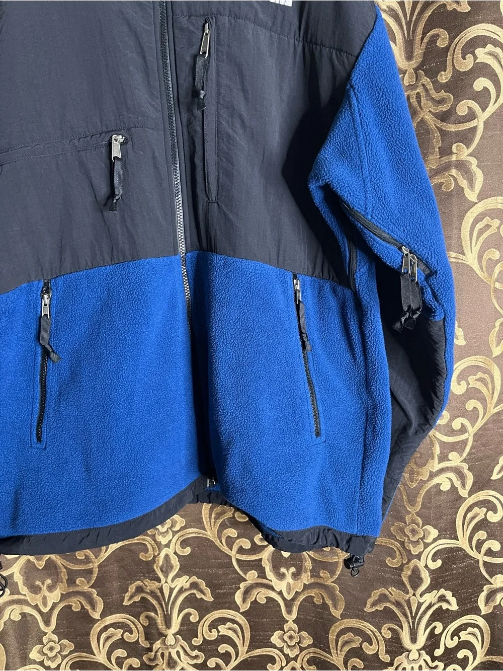 The North Face Men’s Black Denali Jacket with Blue Fleece Lining